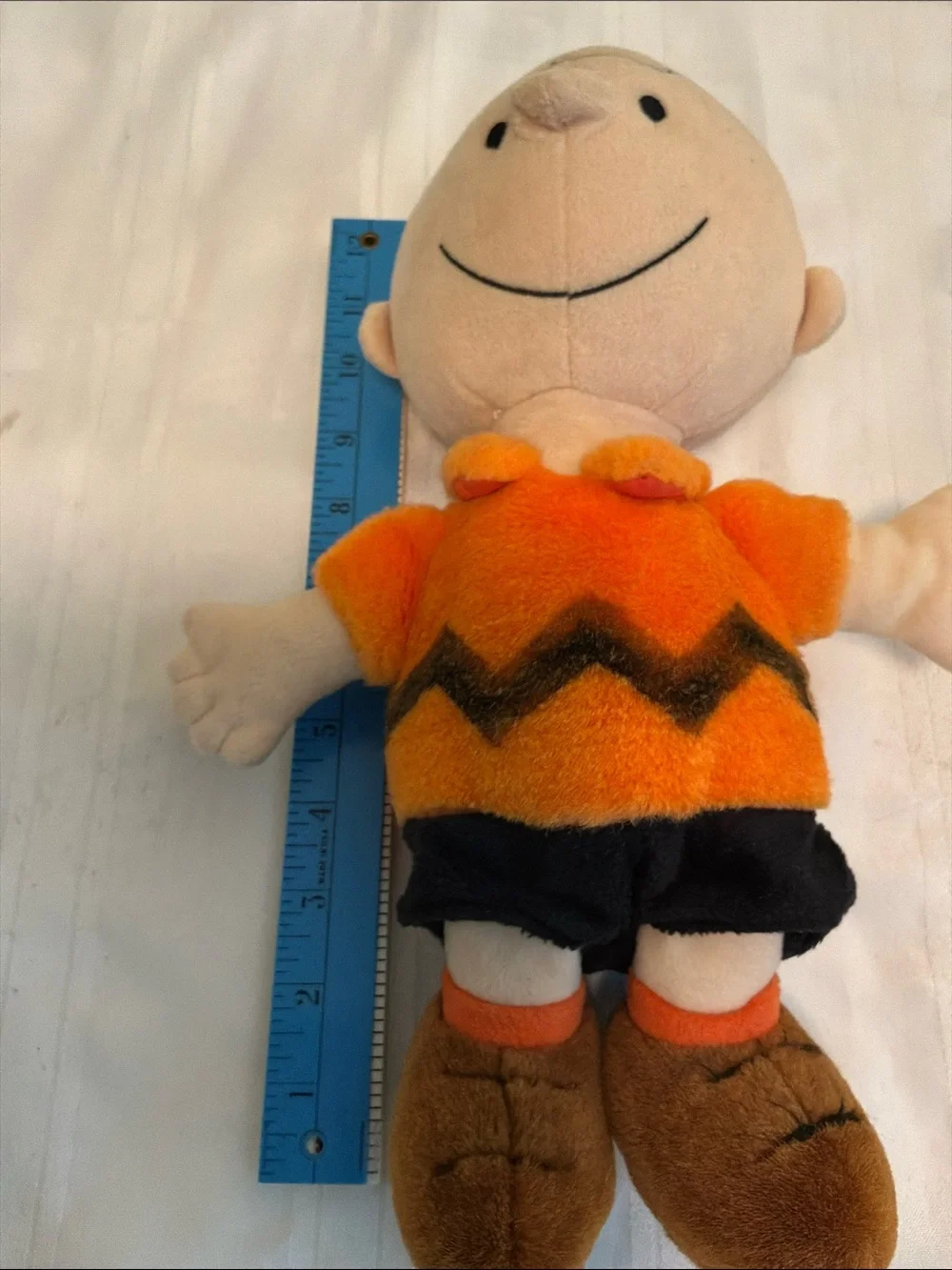 Orange Charlie Brown Plush Toy with Zigzag Shirt